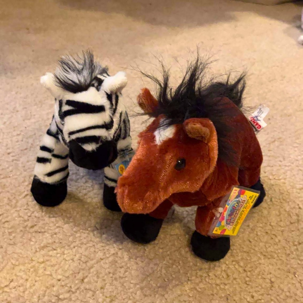 2 Brand new Webkinz with codes and tags
